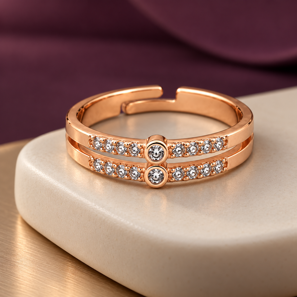 Celeste adjustable ring with two round centre settings on a ceramic plinth