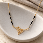 Varnika angular openwork mangalsutra on sculpted porcelain, photographed at an angle