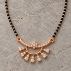 Close detail of Chandrima Mangalsutra floral centre, open crescent and seven drops on limestone