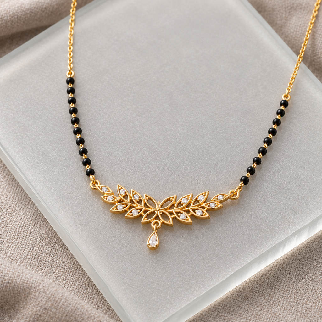 Overhead detail of Madhavi floral mangalsutra on frosted glass