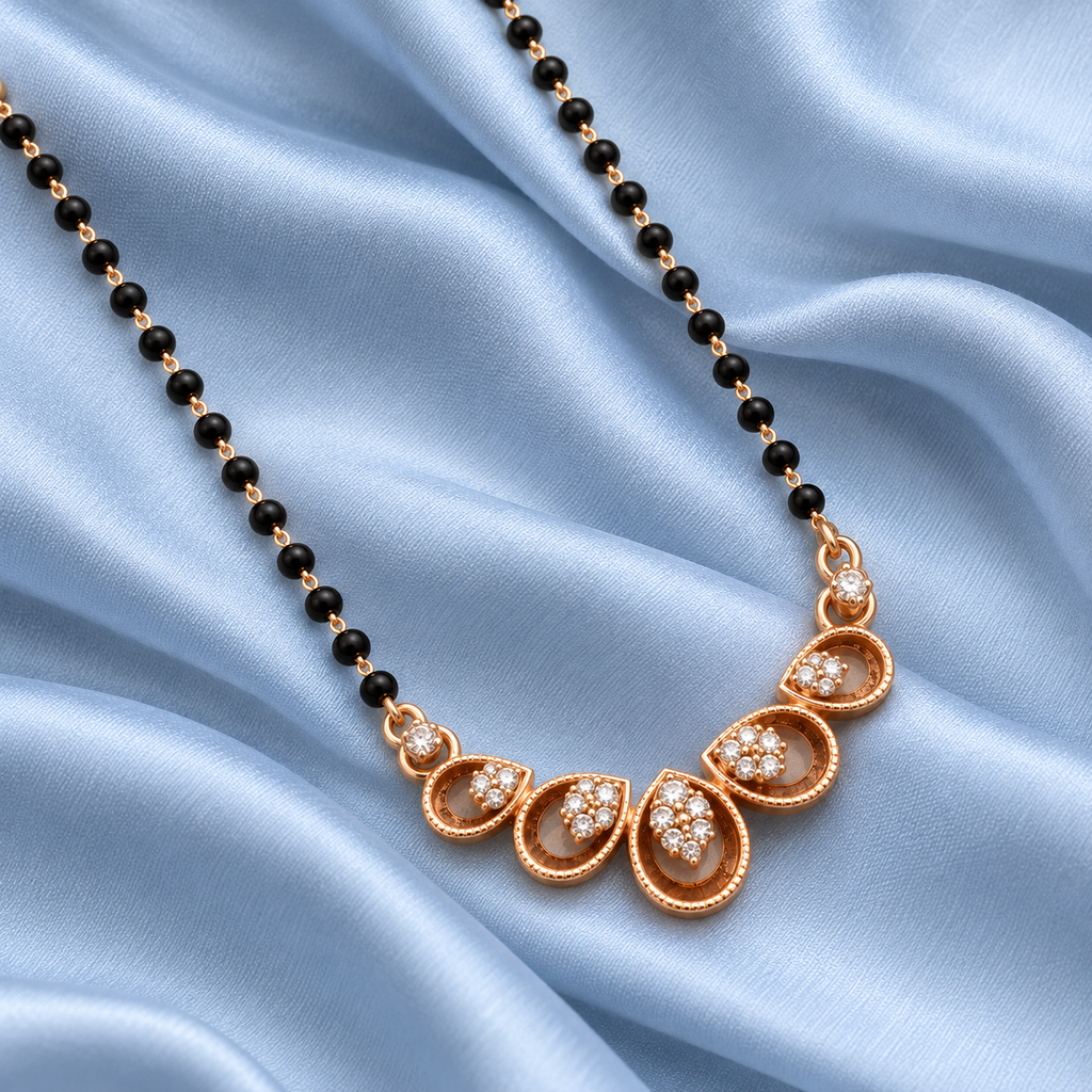 Neerja Mangalsutra clear-stone teardrop details arranged on pale blue silk