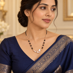 Star mangalsutra styled with a complete midnight blue saree