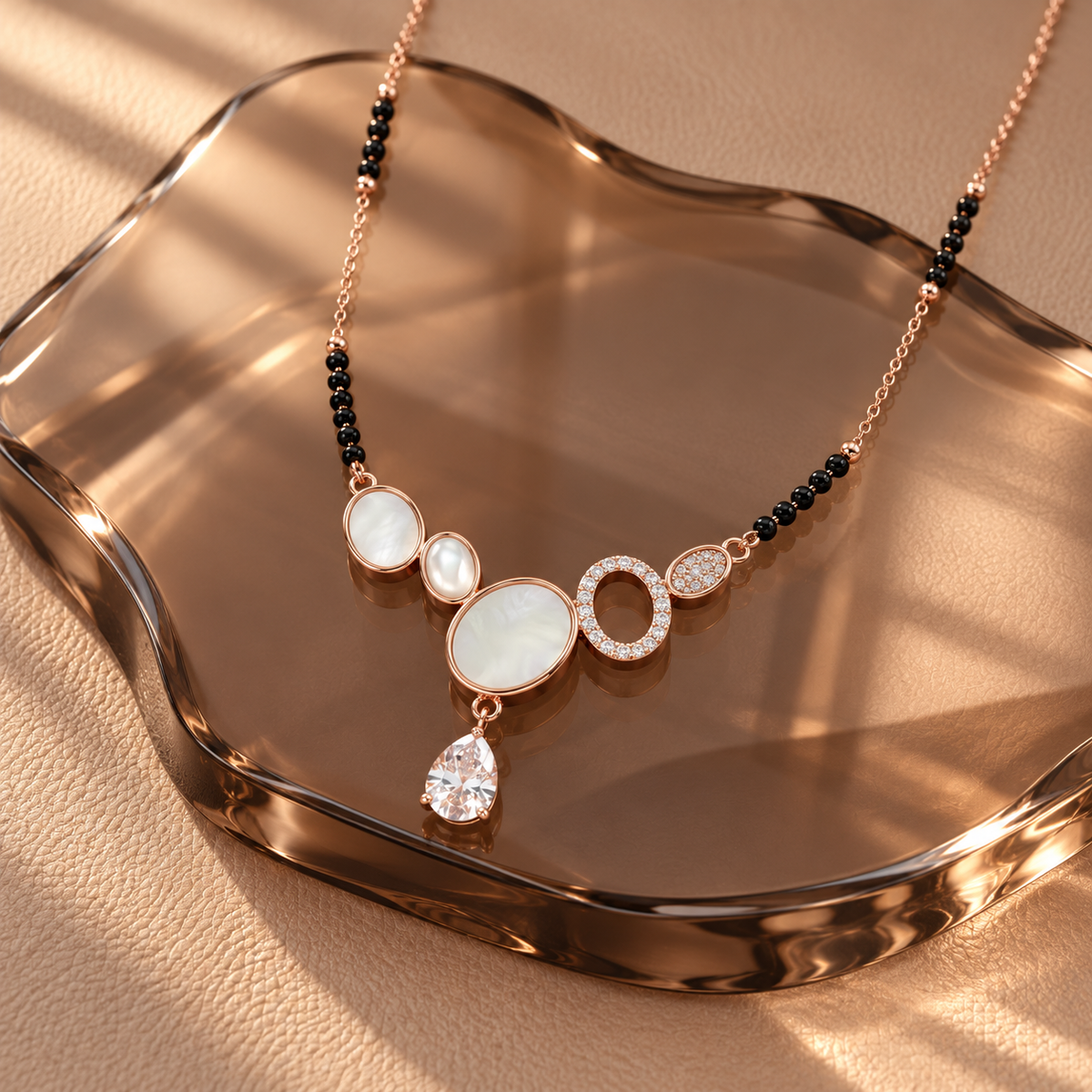 Elara Mangalsutra at an angle on smoked glass