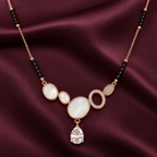 Elara Mangalsutra in an overhead detail on aubergine satin