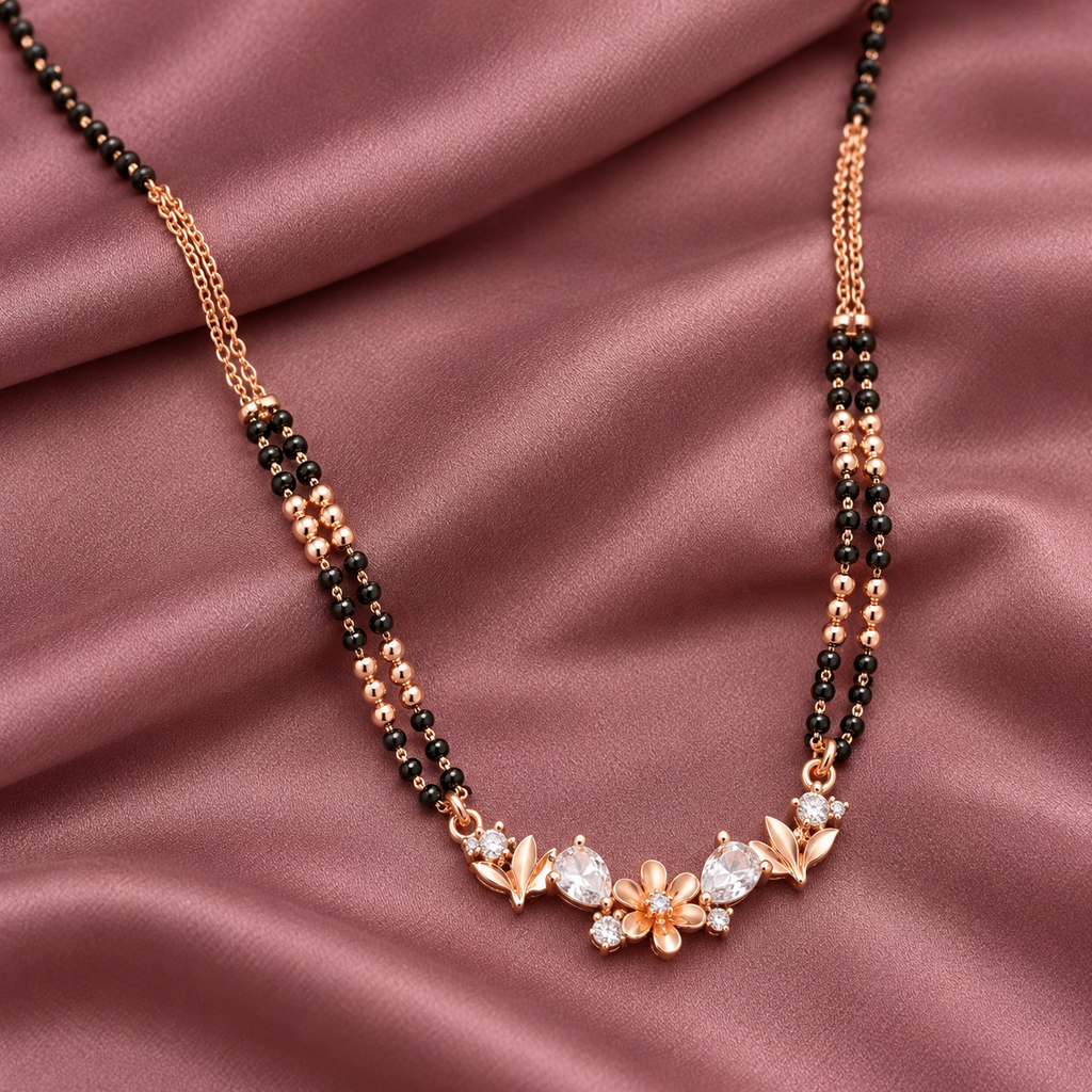 Fiora Mangalsutra in an overhead detail on mauve silk