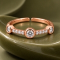 Trinity Ring on an olive sculptural ceramic support
