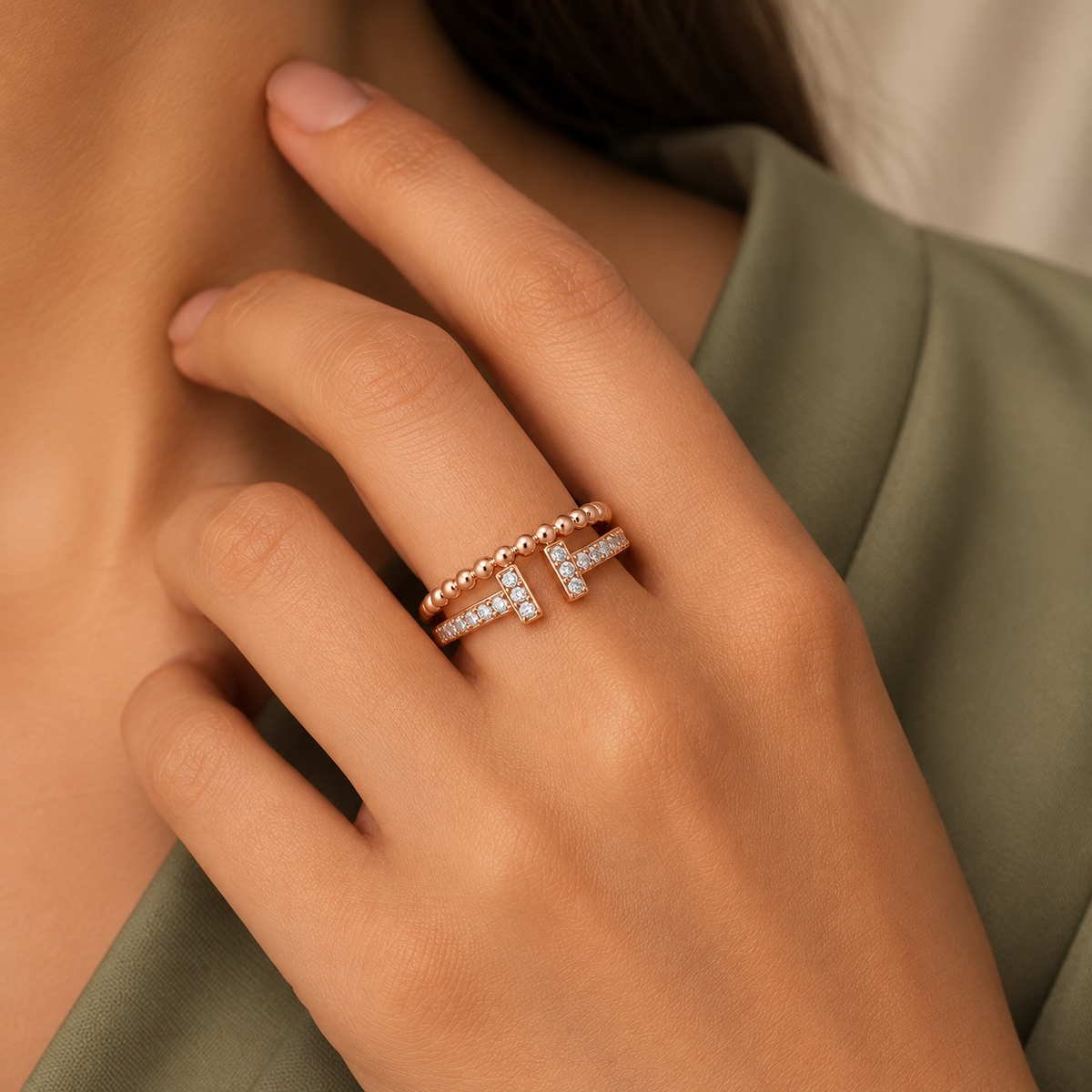 Vivienne Ring rose gold plated ring worn snugly beside a sage professional dress