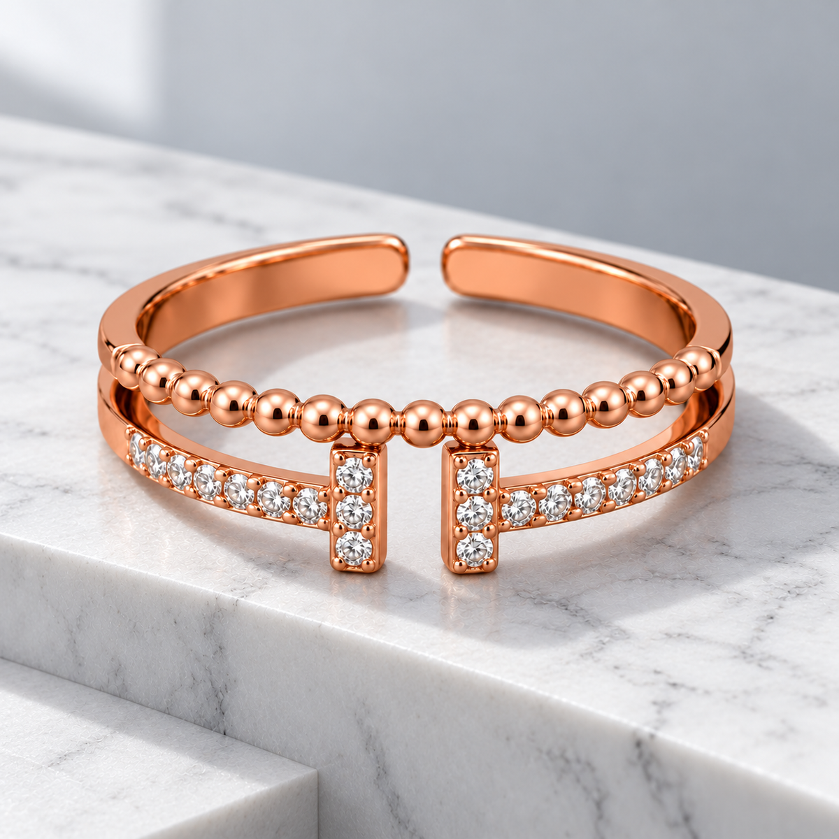 Vivienne Ring on a white marble architectural step