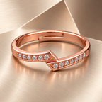 Estelle Ring on brushed champagne metal with a geometric fold