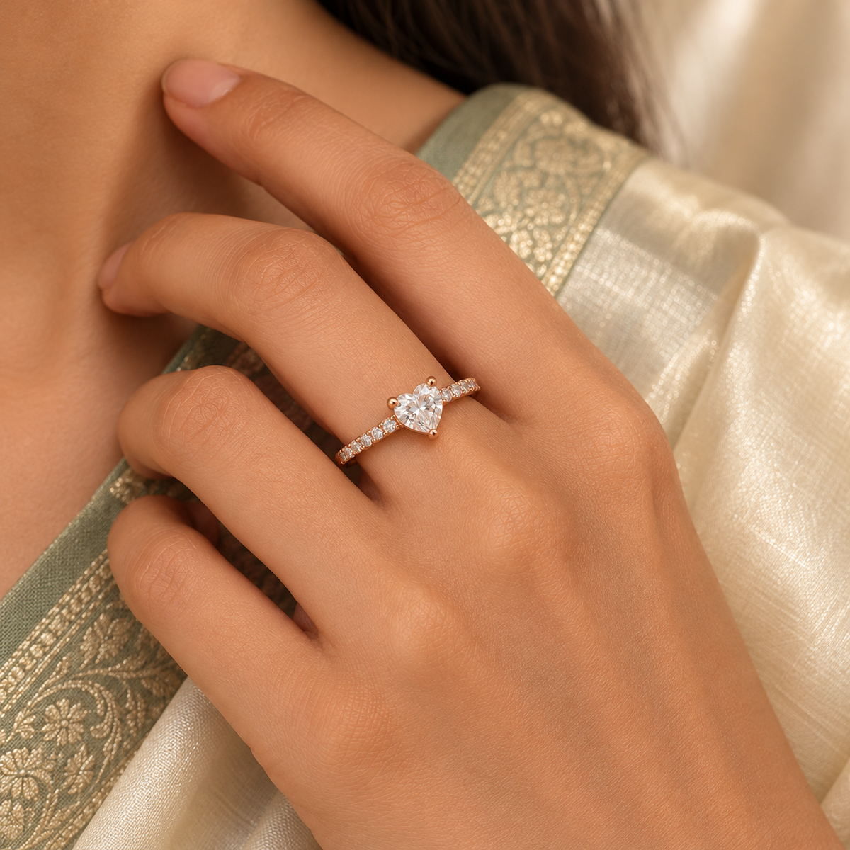 Arabella Ring rose gold plated ring worn snugly beside an ivory and sage saree