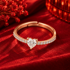Arabella Ring rose gold plated ring from a higher angle on crimson velvet with festive red bokeh