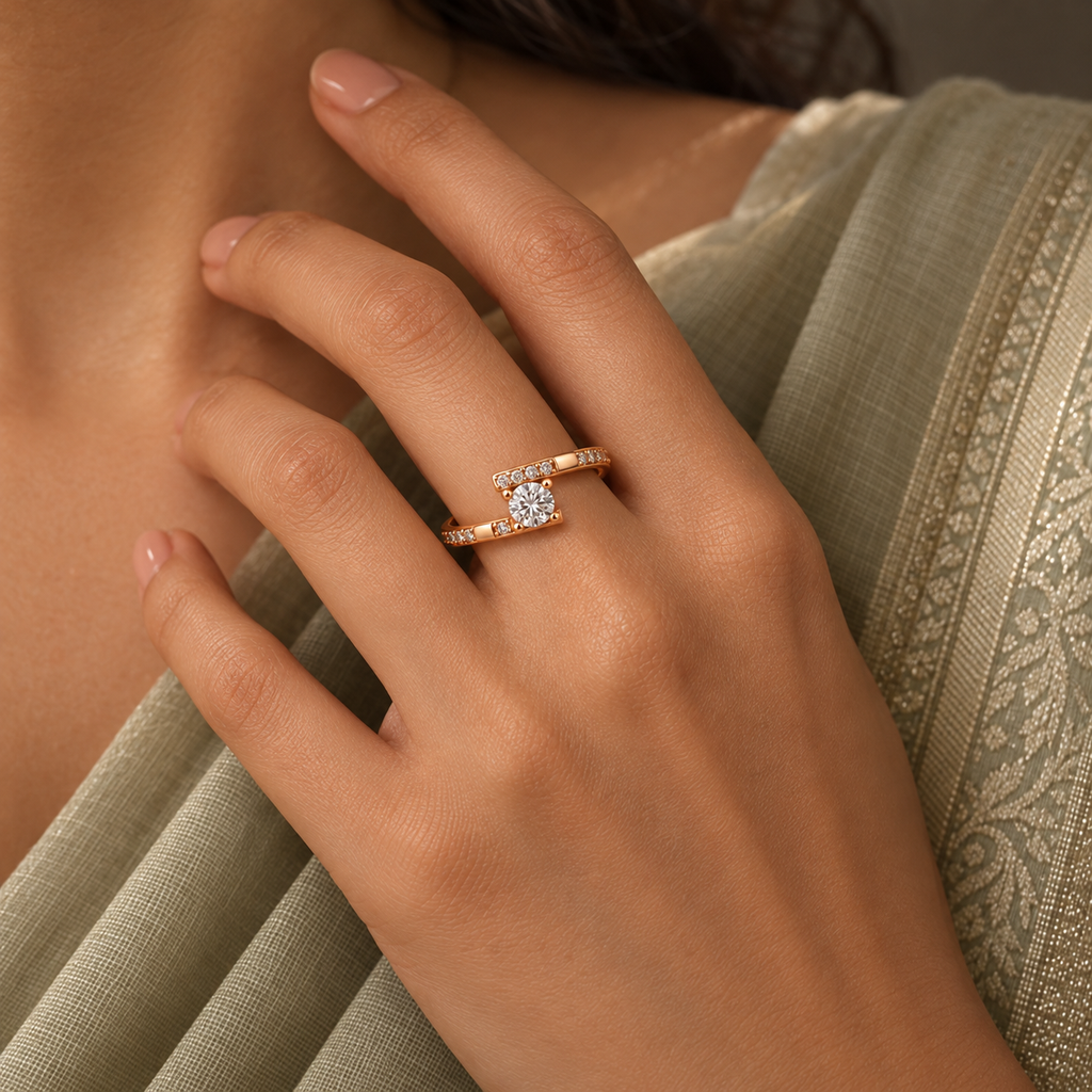 Clarisse Ring in rose gold, worn snugly on a model's hand beside elegant elegant ivory or soft sage saree with proper draping and a modest covered chest