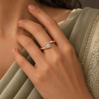 Clarisse Ring in rose gold, worn snugly on a model's hand beside elegant elegant ivory or soft sage saree with proper draping and a modest covered chest
