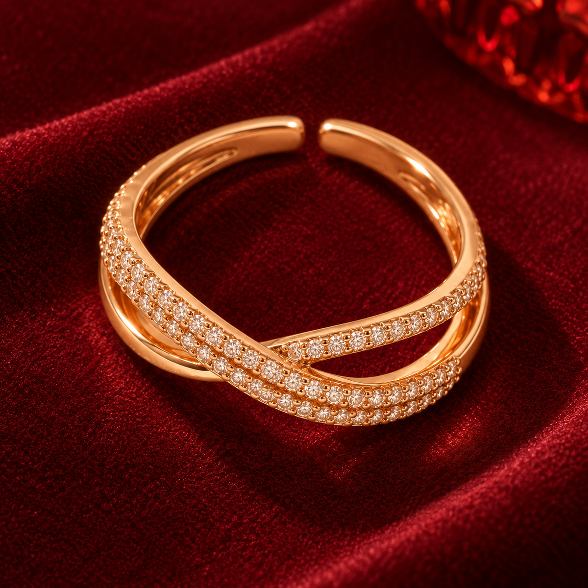 Evangeline rose gold plated crossover ring — festive detail in premium editorial lighting