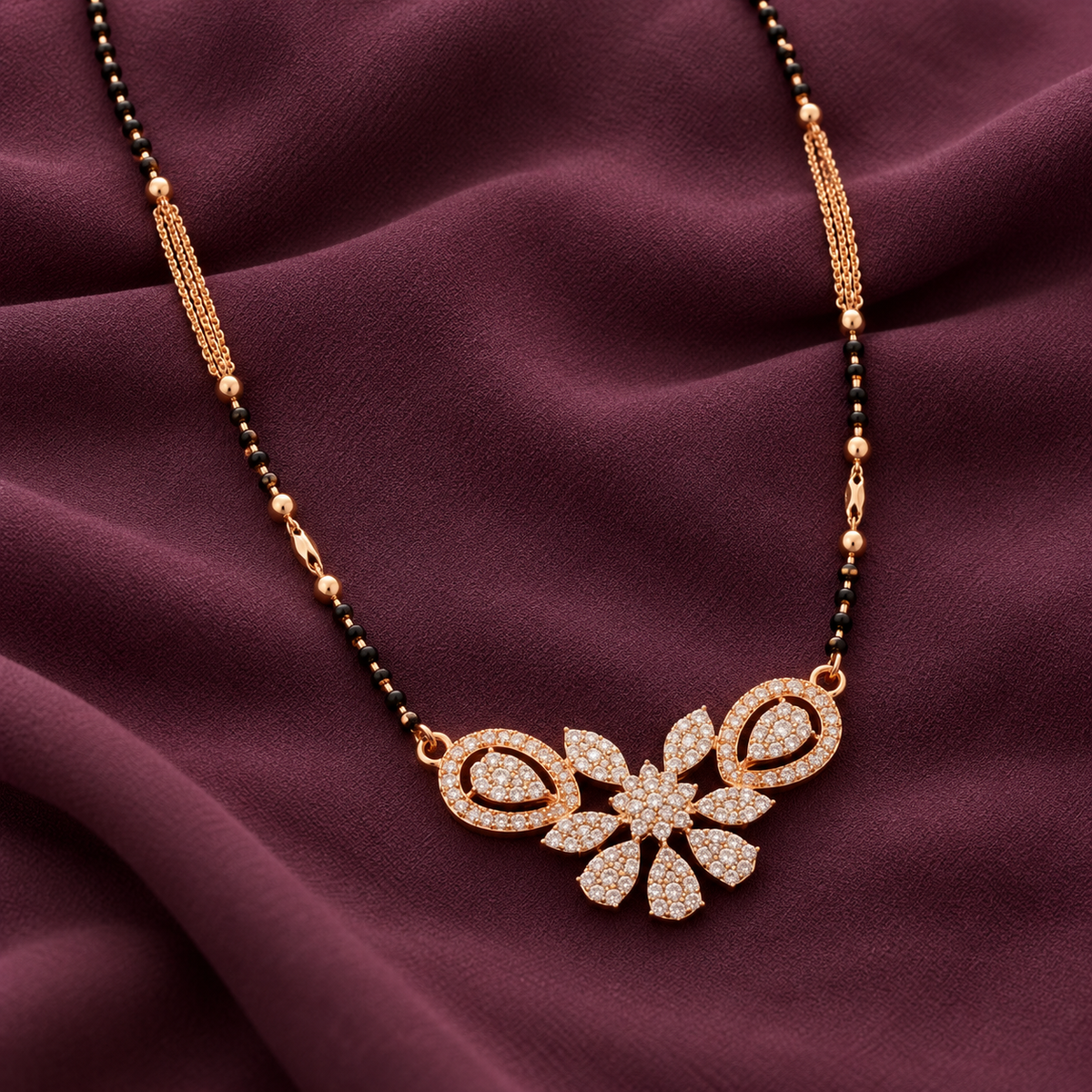 Rosamere floral pendant macro on plum crepe