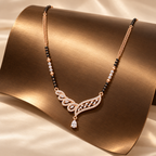 Solenne Mangalsutra — angled product view on brushed bronze